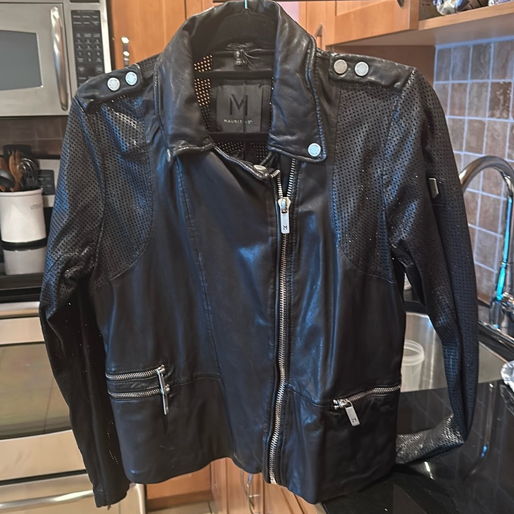 Waist length black leather jacket with beautiful detailing